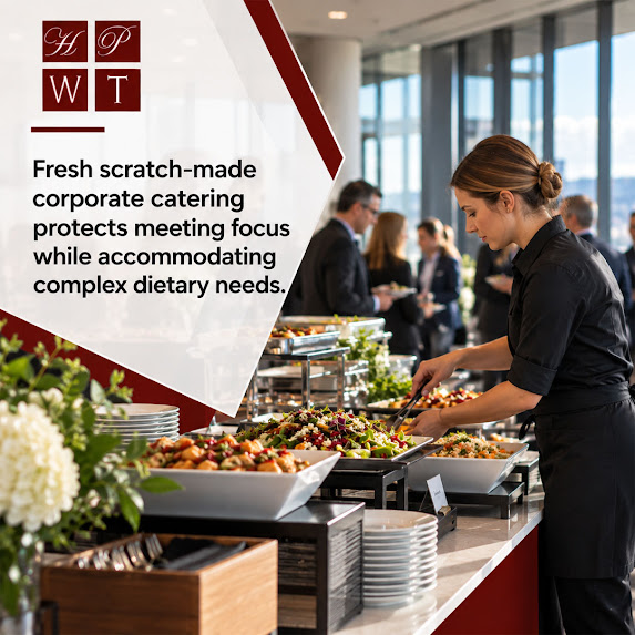 Caterer serving fresh salads and entrees from a buffet line at a corporate event with guests in business attire