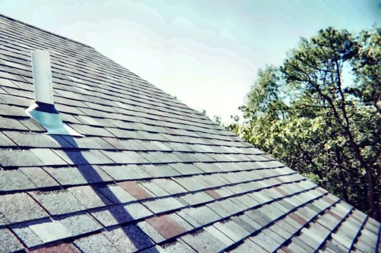 Asphalt shingle roof with plumbing vent flashing on an earlier residential roofing project from the career of Certified Roof Systems CEO James Stirling